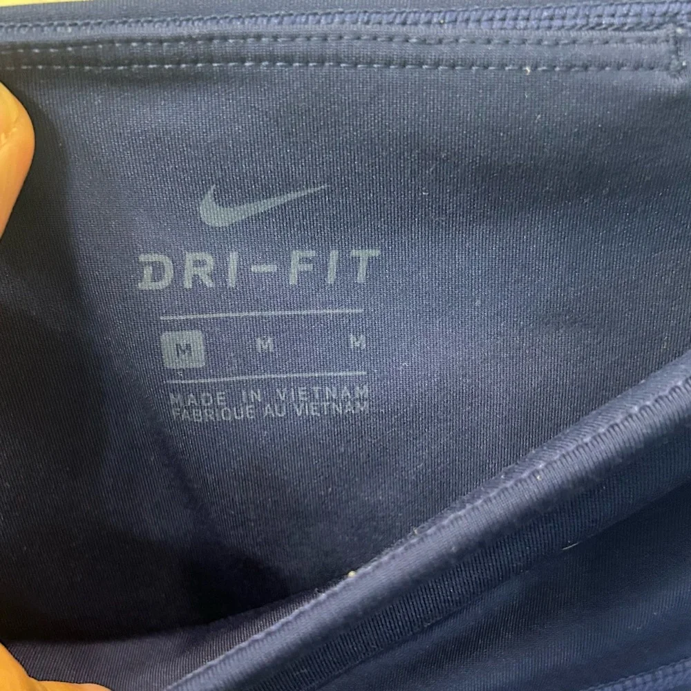 NIKE DRI FIT BLUE WOMEN'S SIDE LOGO‎ METALLIC SILVER RUNNING TIGHTS SZ M